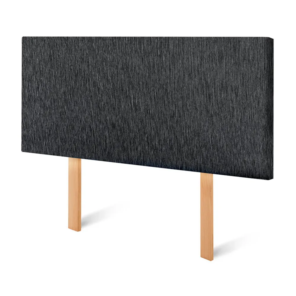 Cabecera gris carbón con decoración de vinilos y cuadros musicales.
ALT: cabecera charcoal para dormitorio rockero